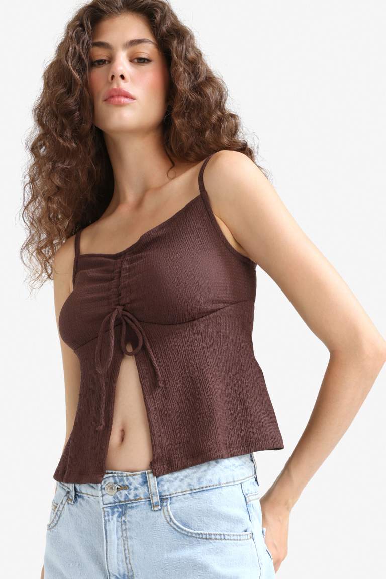 A Cut Thin Strap Front Tie Blouse