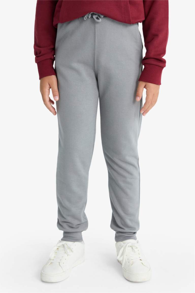 طقم اولادي قصة عادية سويت شيرت خمري وسويت بانتس - قطعتين