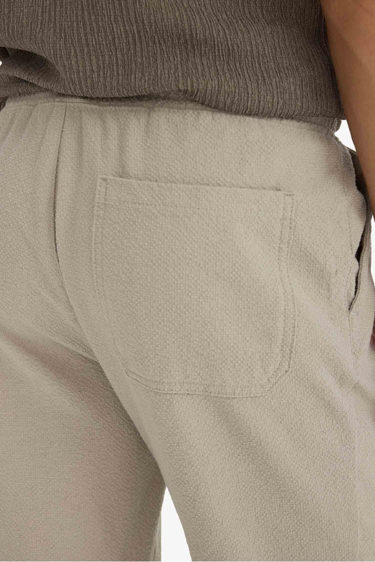 Jogger Fit Beli Bağcıklı Lastikli Cepli Pamuklu Dokulu Pantolon