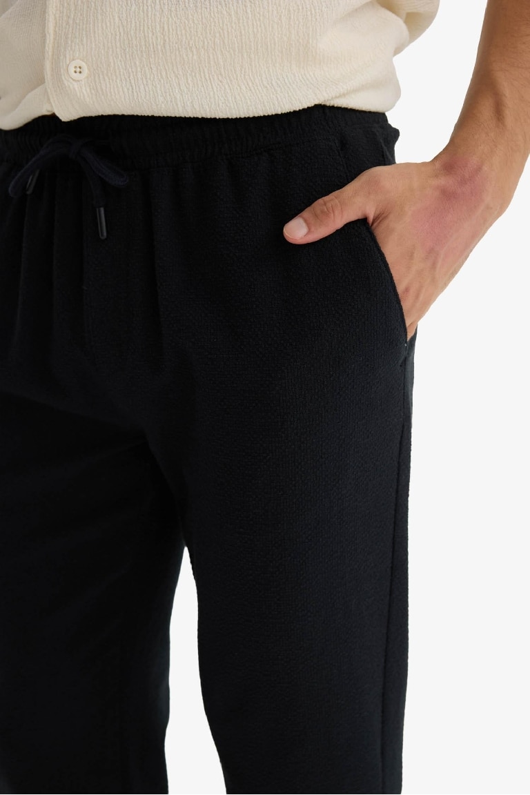 Jogger Fit Beli Bağcıklı Lastikli Cepli Pamuklu Dokulu Pantolon