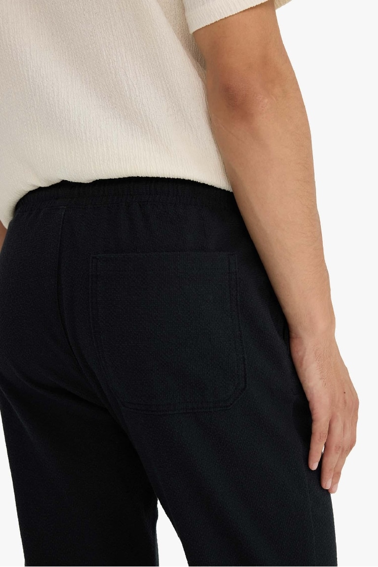 Jogger Fit Beli Bağcıklı Lastikli Cepli Pamuklu Dokulu Pantolon
