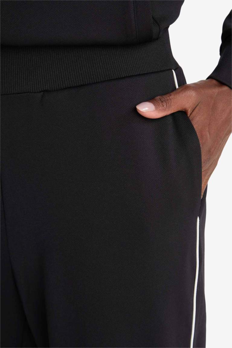 DeFactoFit Wide Leg Geniş Paça Cepli Biyeli Standart Boy İçi Yumuşak Tüylü Sporcu Pantolon
