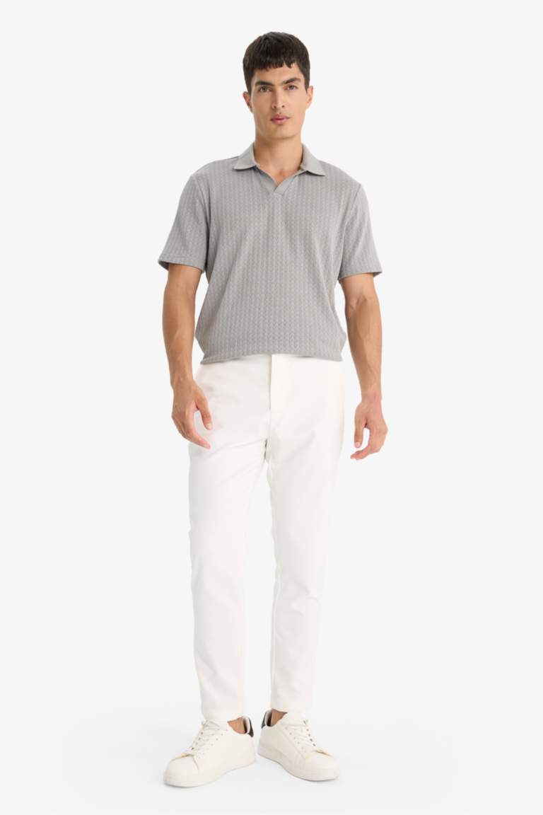 تيشيرت بولو ذو مظهرتريكو