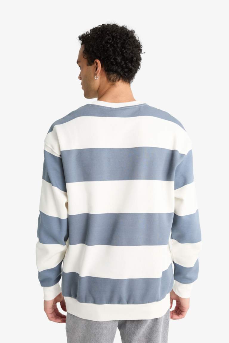 سويت شيرت مخطط أوفر سايز بياقة مستديرة