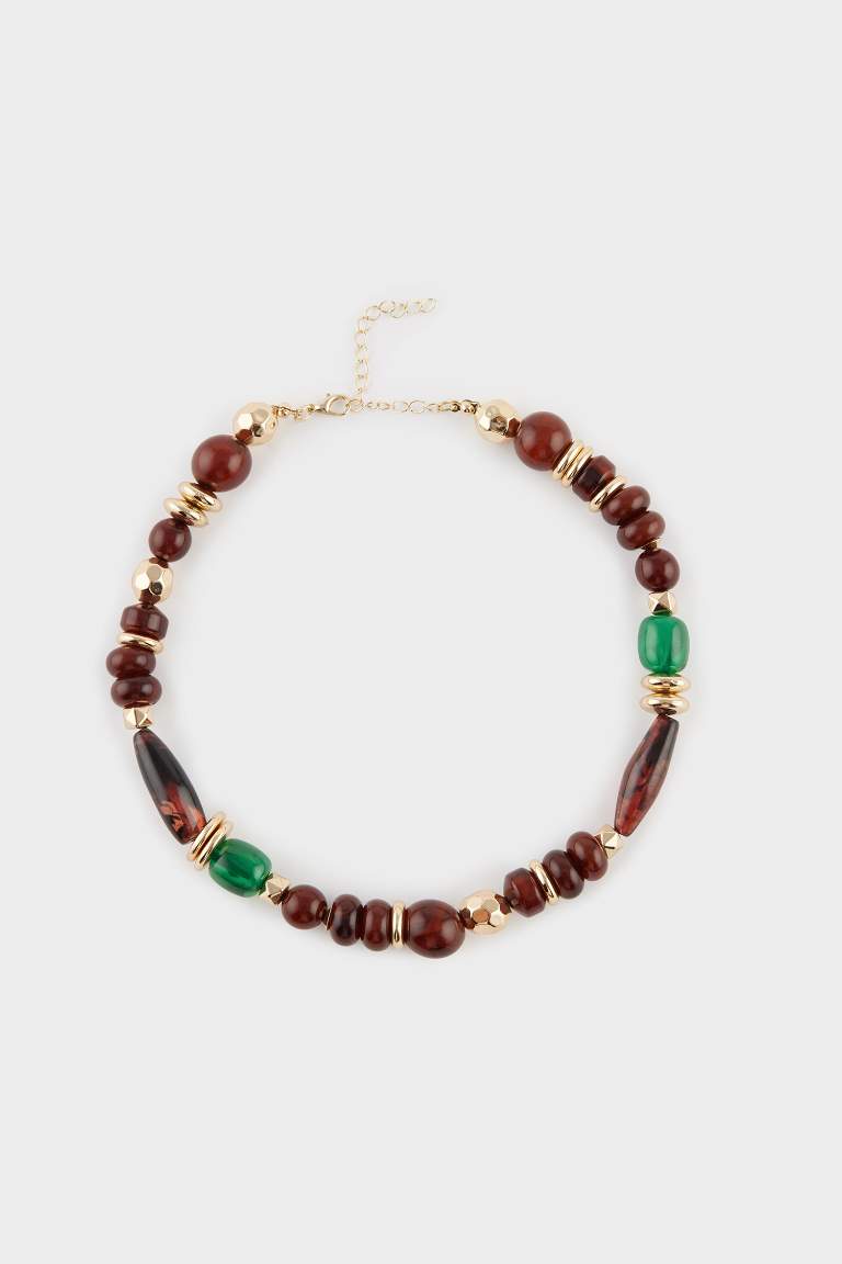 Collier doré avec pierres marron et vertes pour femme