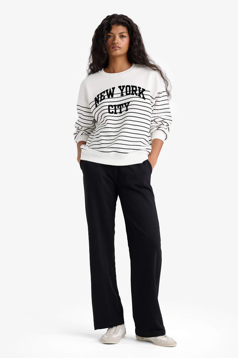 Pantalon de survêtement droit basique à poches et taille élastique