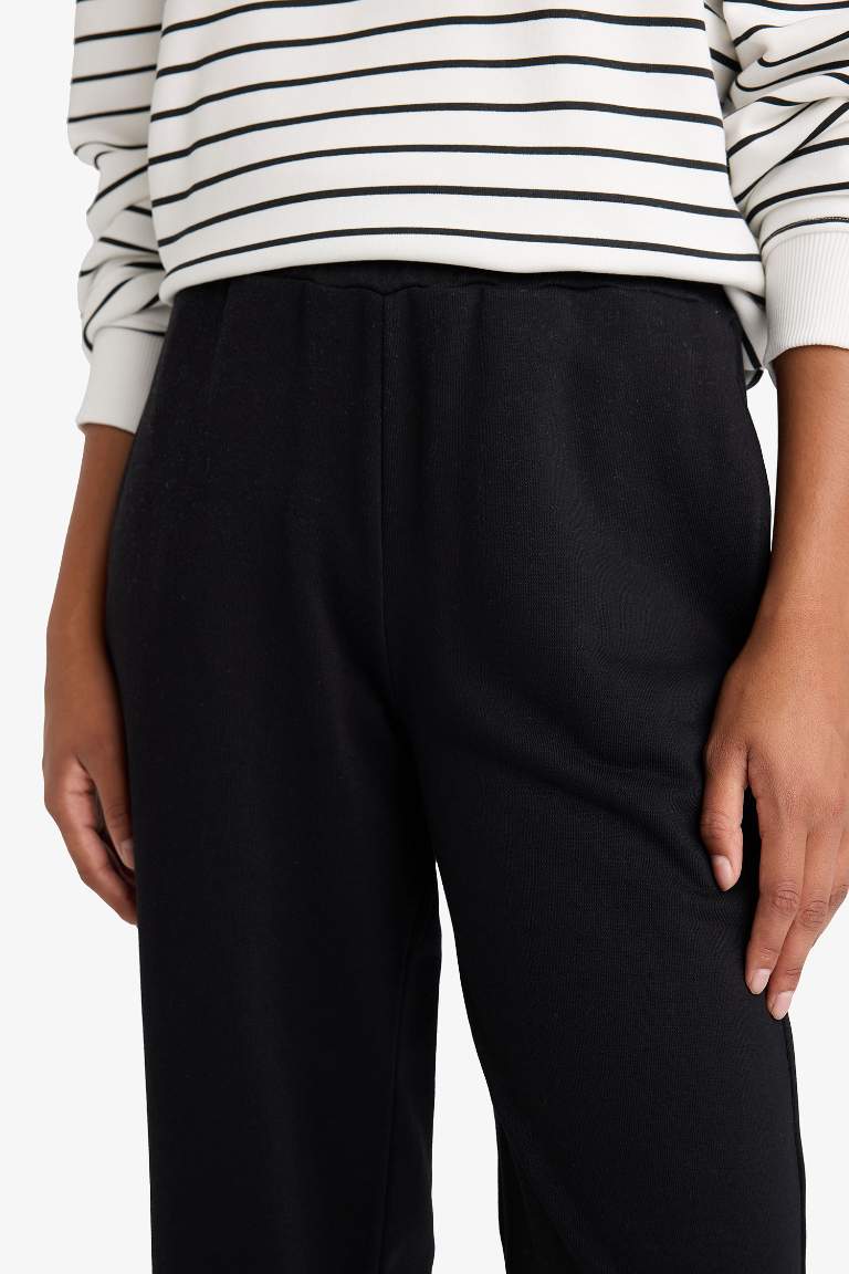 Pantalon de survêtement droit basique à poches et taille élastique