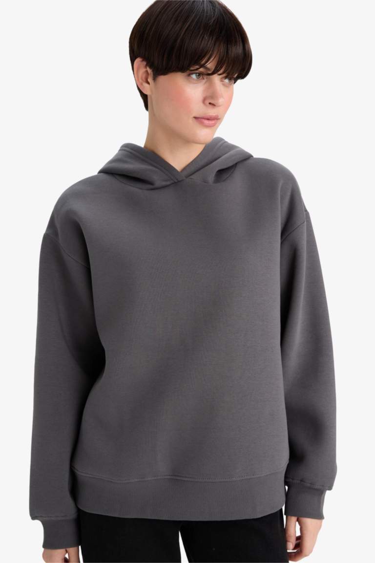 سويت شيرت قصة مريحة