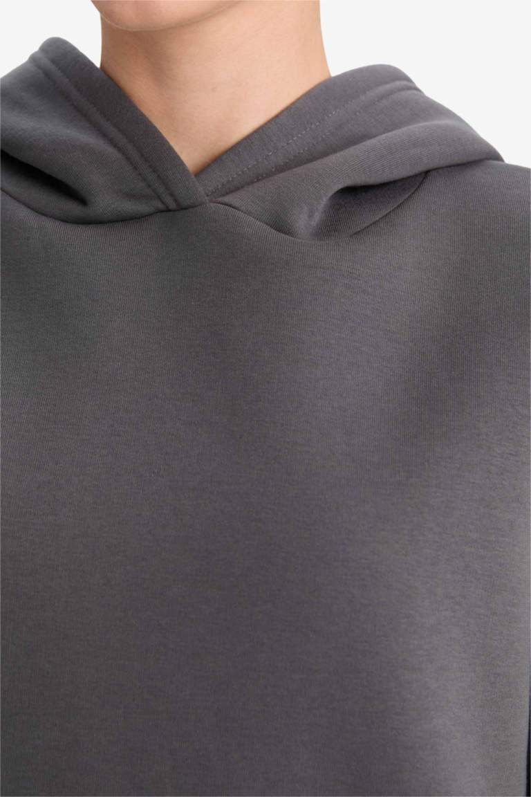 سويت شيرت قصة مريحة