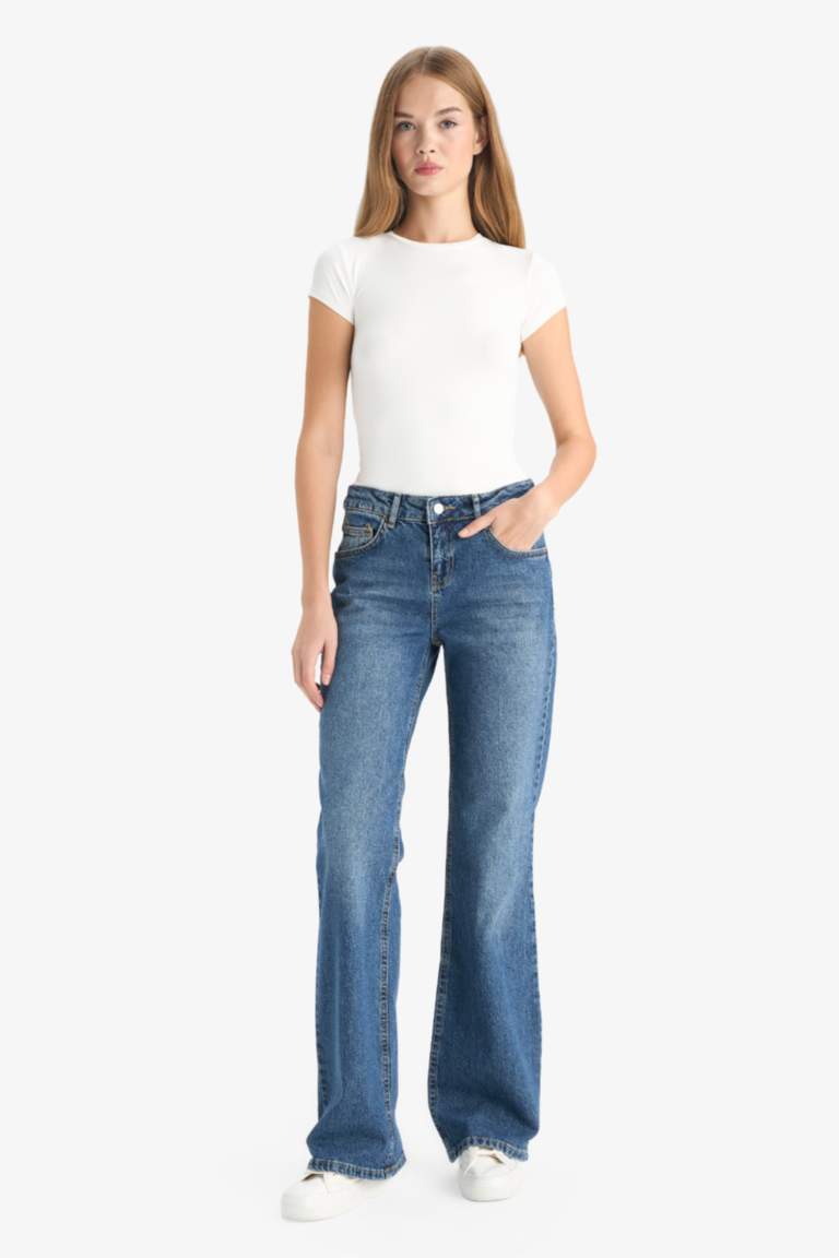 Jean taille basse à effet délavé