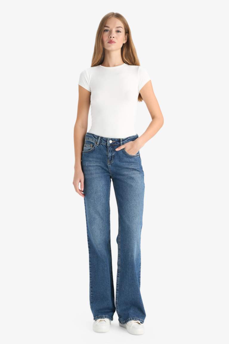 Jean taille basse à effet délavé