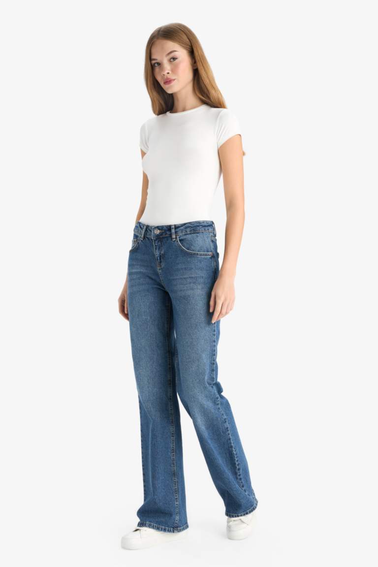 Jean taille basse à effet délavé