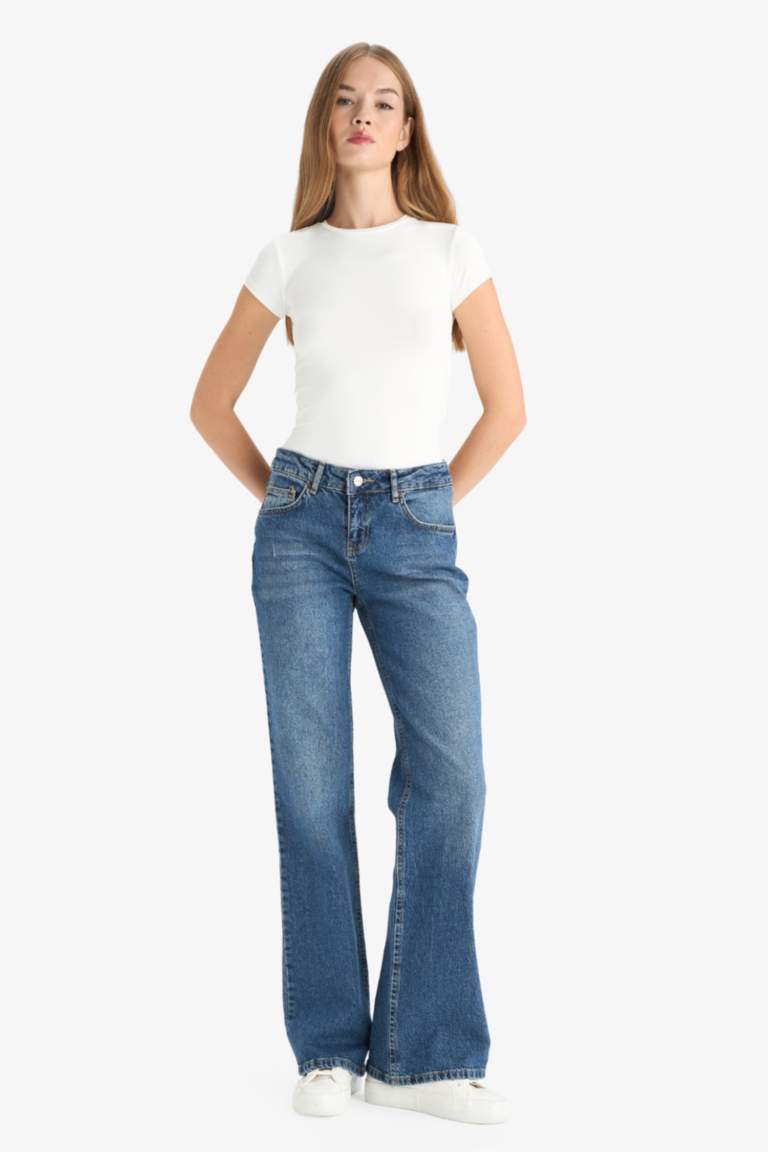 Jean taille basse à effet délavé
