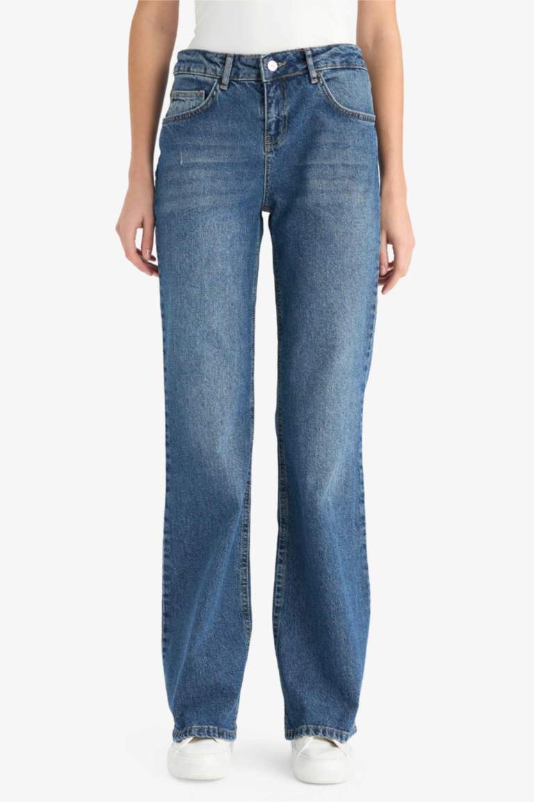 Jean taille basse à effet délavé
