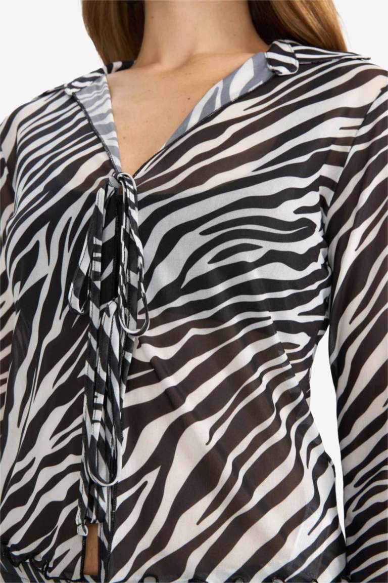 Fitted Polo Neck Zebra Print Tie Front Tulle Blouse