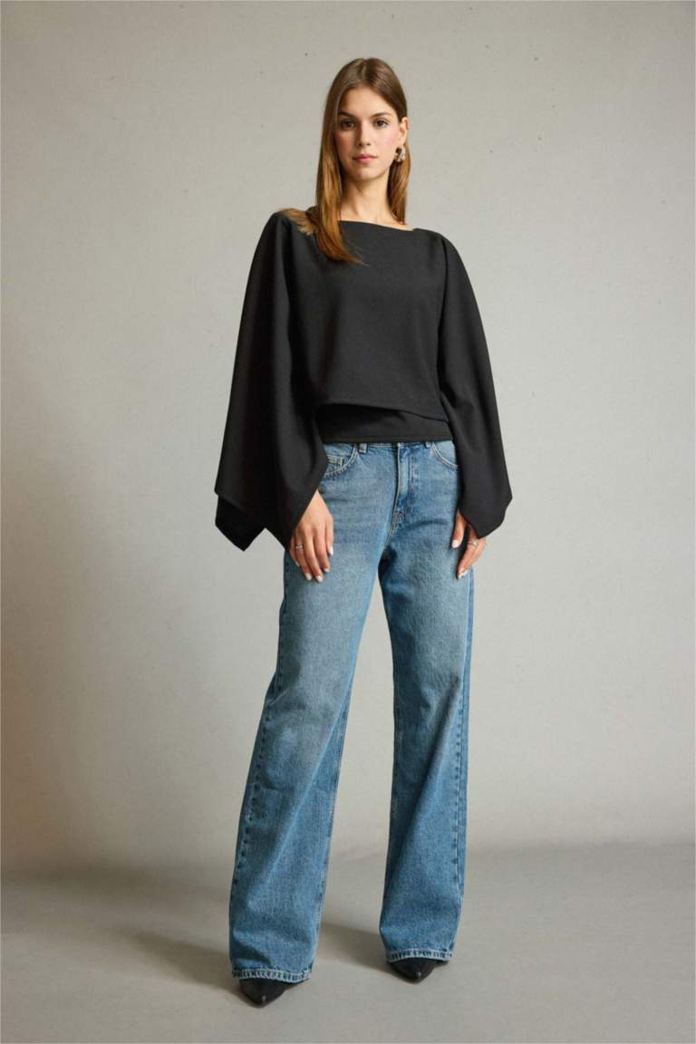 بلوزة ردن عريض وياخة عريضة