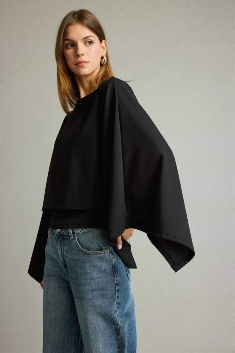 بلوزة ردن عريض وياخة عريضة