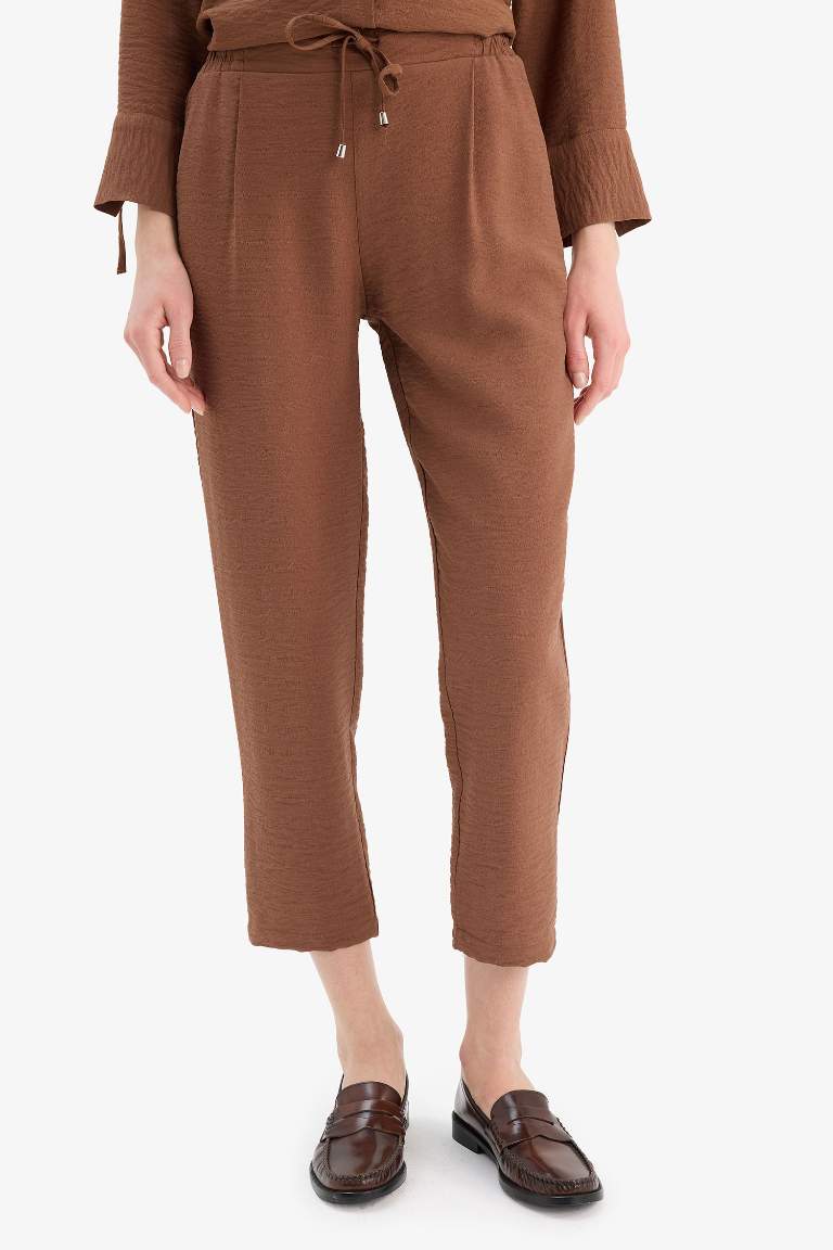 Pantalon en lin droit à taille haute avec poches