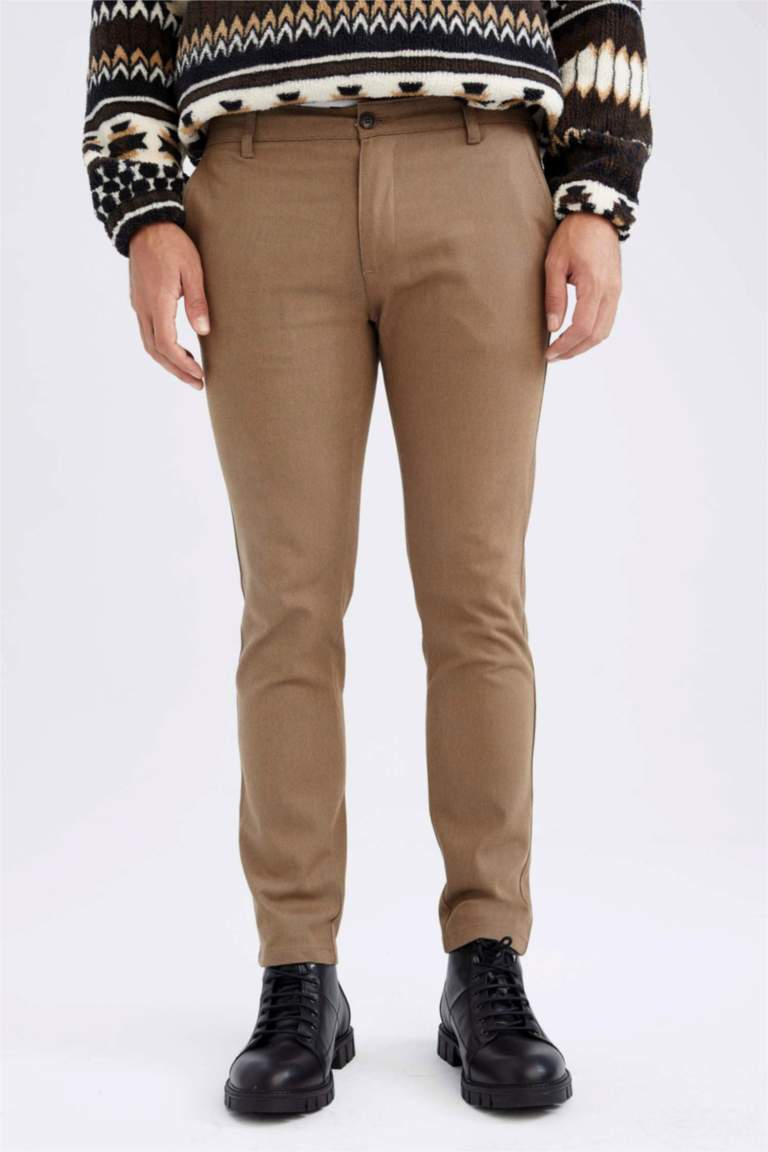 Pantalon ciré coupe slim à coutures contrastantes - Marron
