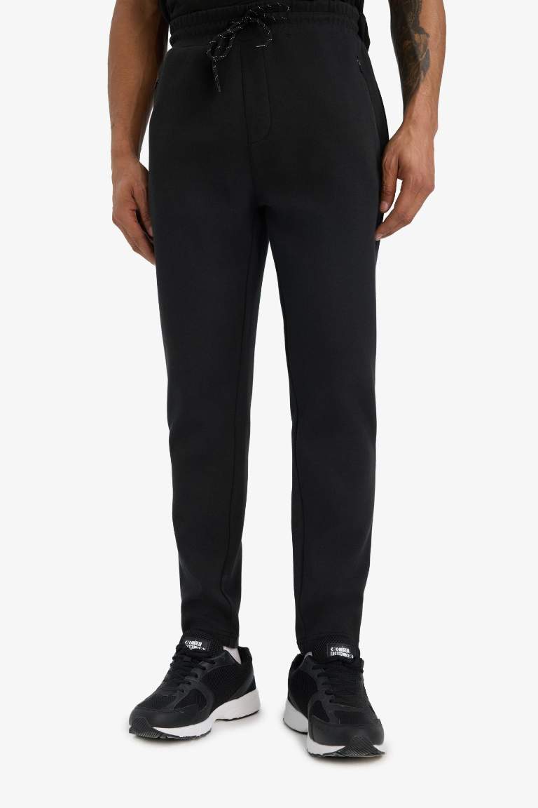 DeFactoFit Slim Fit Dar Kesim Fermuarlı Standart Paça Jogger Eşofman Altı