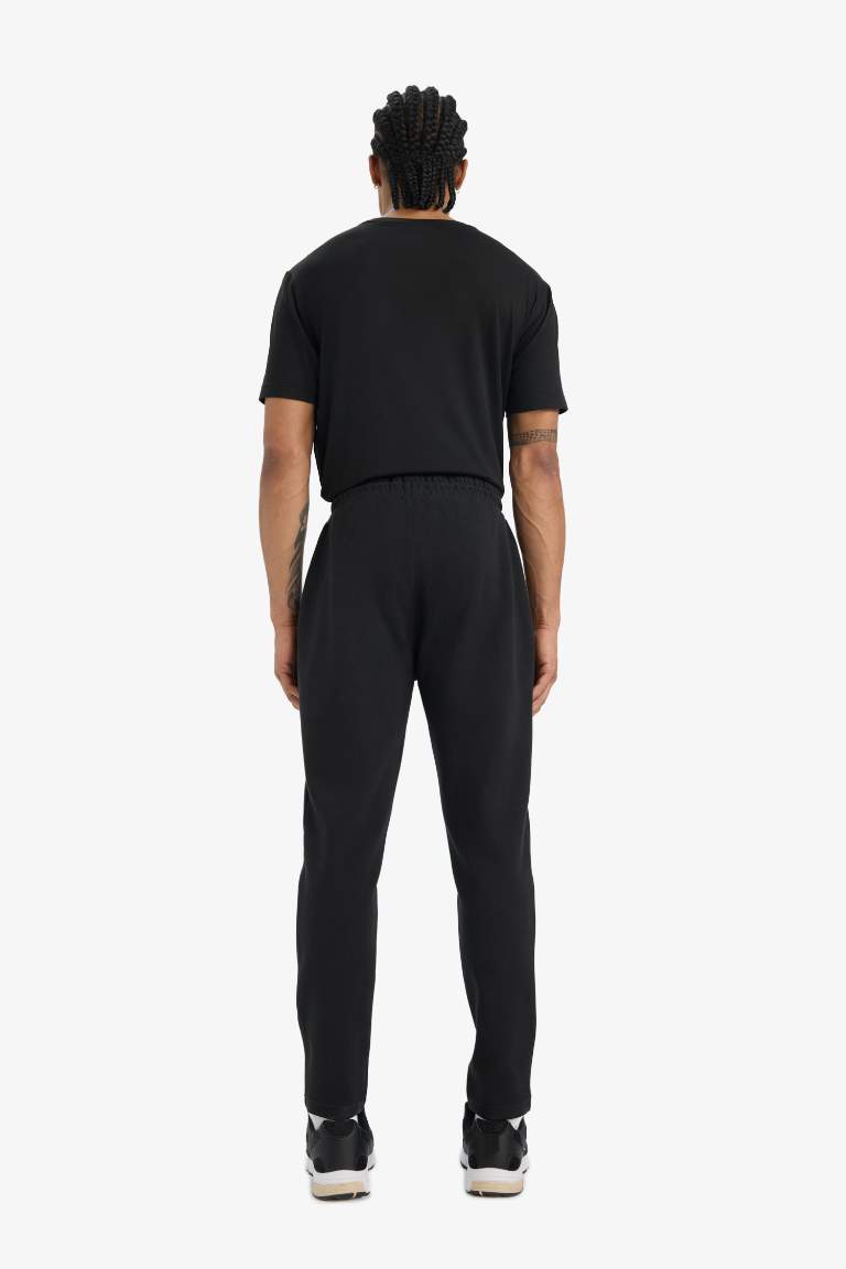 DeFactoFit Slim Fit Dar Kesim Fermuarlı Standart Paça Jogger Eşofman Altı