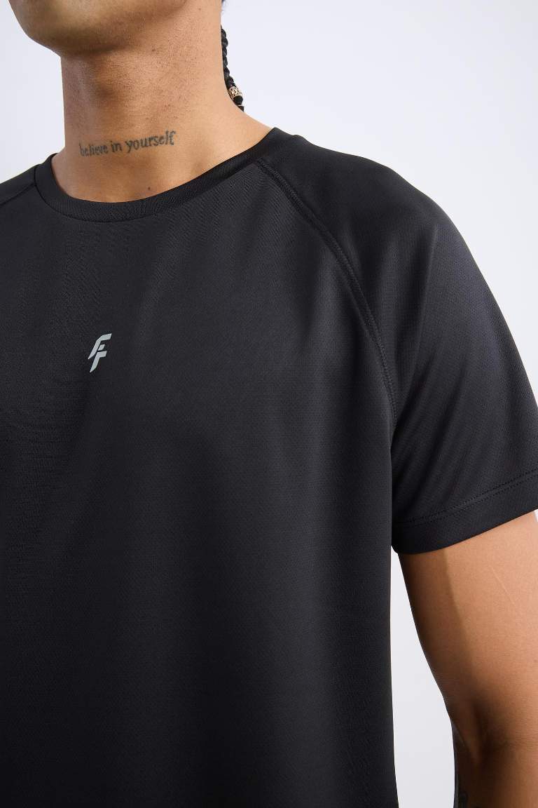 T-Shirt de sport slim imprimé à col rond de DeFactoFit