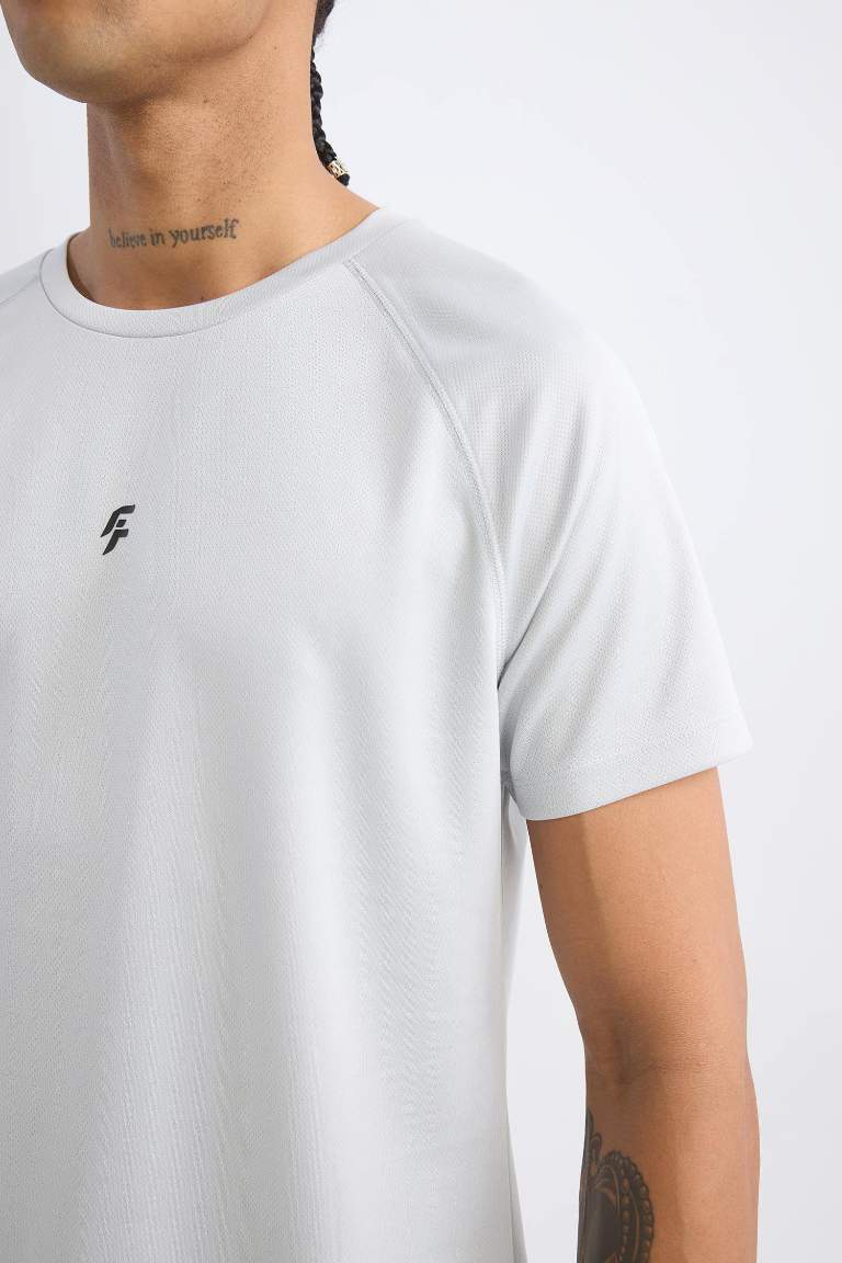 T-shirt de sport slim imprimé à col rond de DeFactoFit