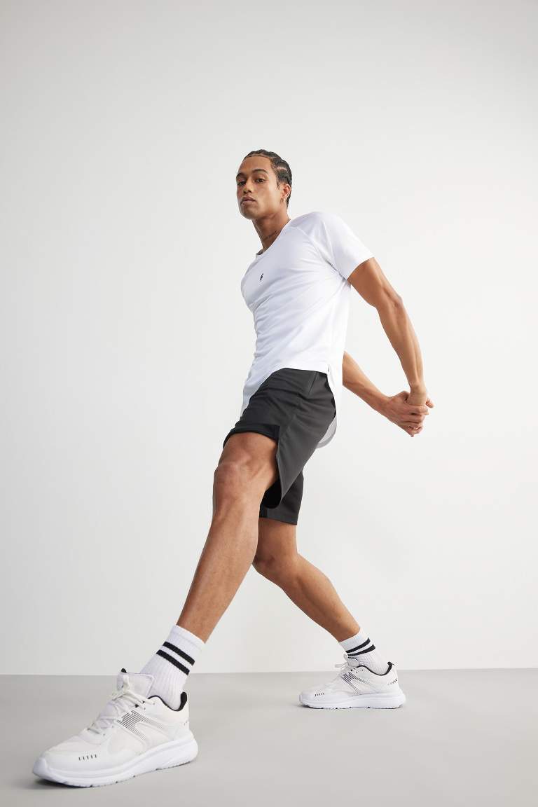 DeFactoFit Hızlı Kuruyan Slim Fit Dar Kesim Sporcu Standart Paça Şort