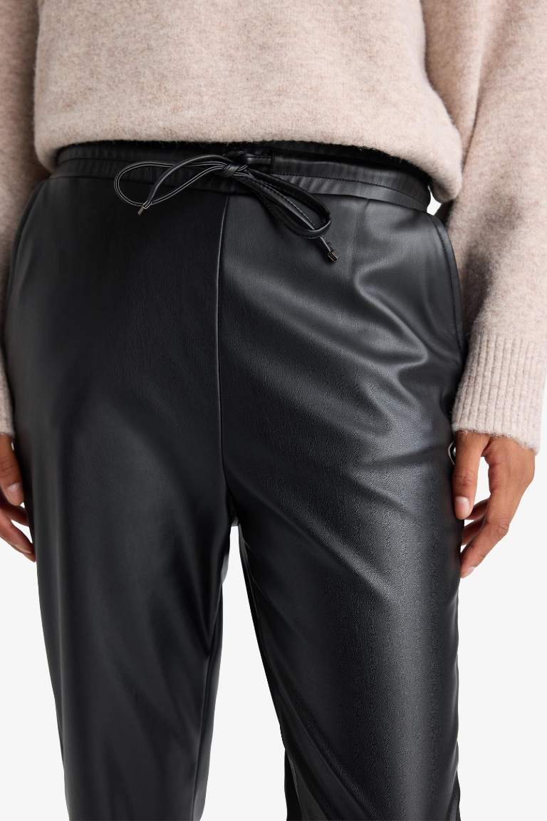 Jogger Fit Cepli Yüksek Bel Standart Paça Suni Deri Pantolon