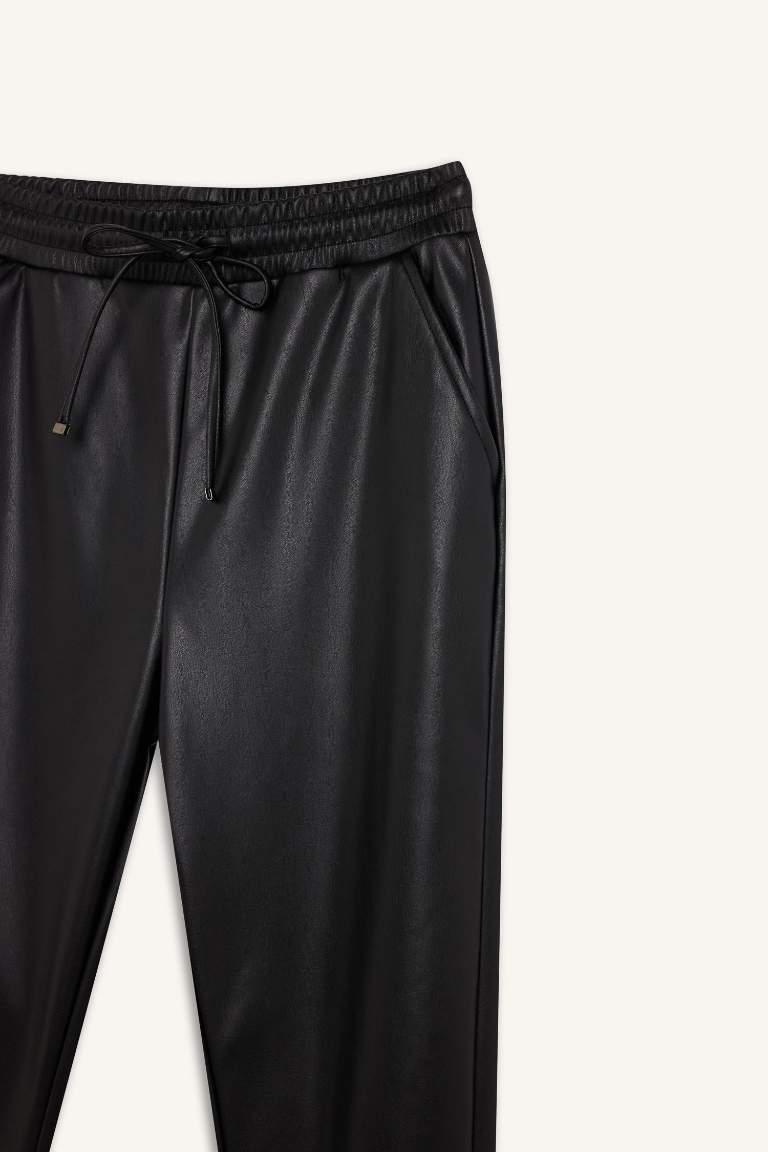 Jogger Fit Cepli Yüksek Bel Standart Paça Suni Deri Pantolon