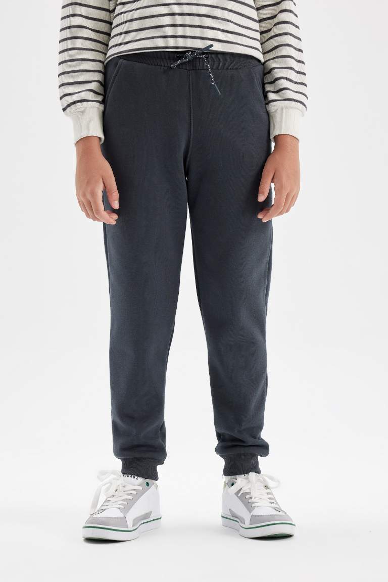 Pantalon de Jogging avec taille et chevilles élastiques et avec poches pour Garçon