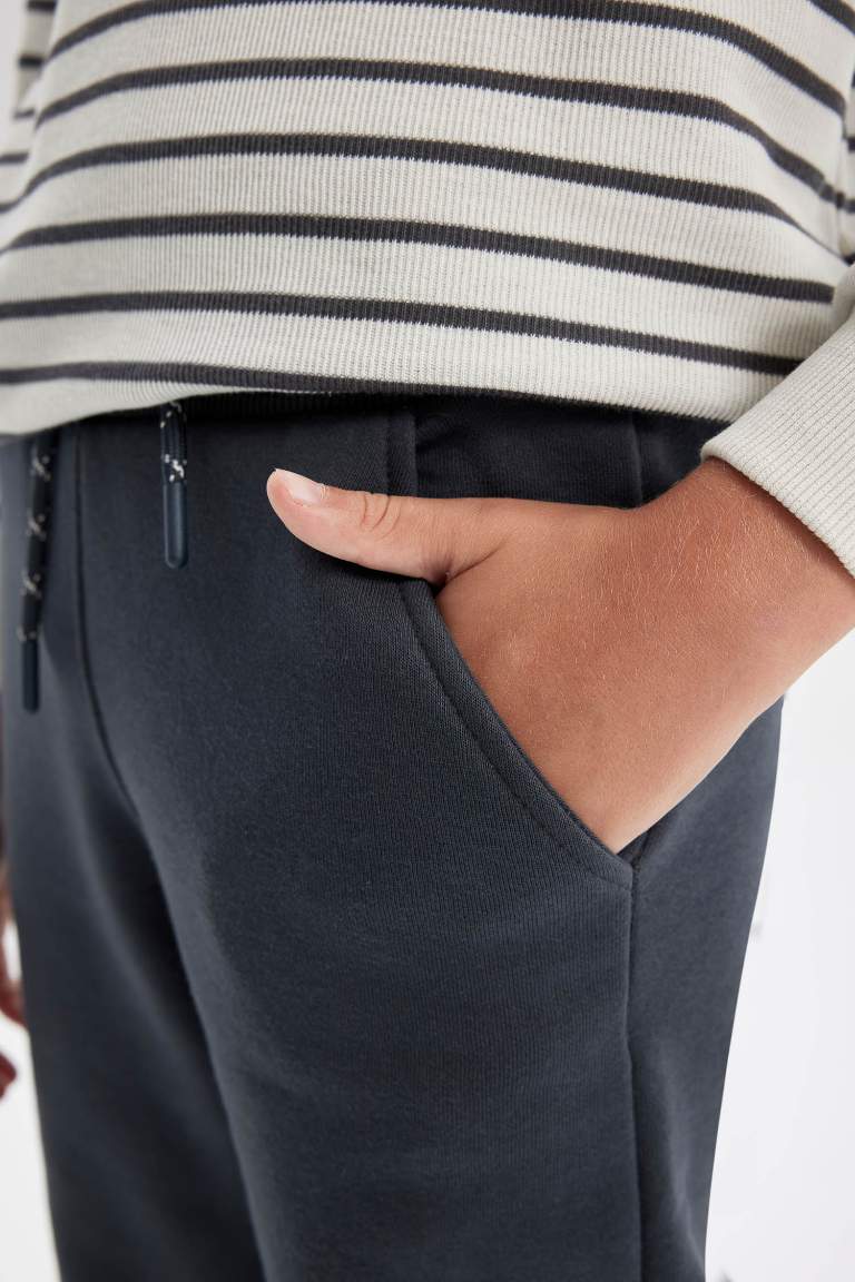 Pantalon de Jogging avec taille et chevilles élastiques et avec poches pour Garçon