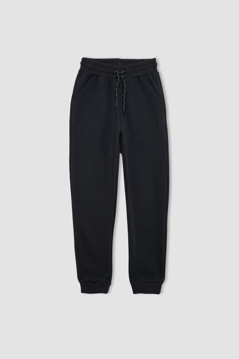 Pantalon de Jogging avec taille et chevilles élastiques et avec poches pour Garçon