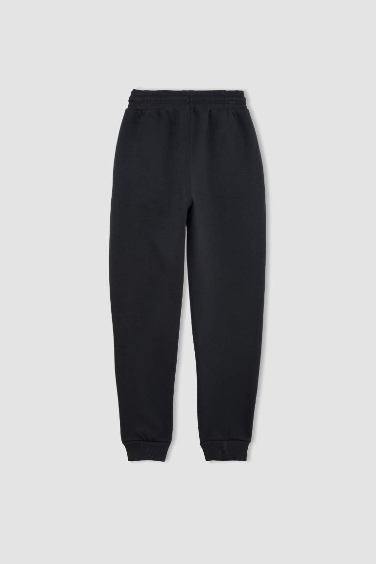 Pantalon de Jogging avec taille et chevilles élastiques et avec poches pour Garçon