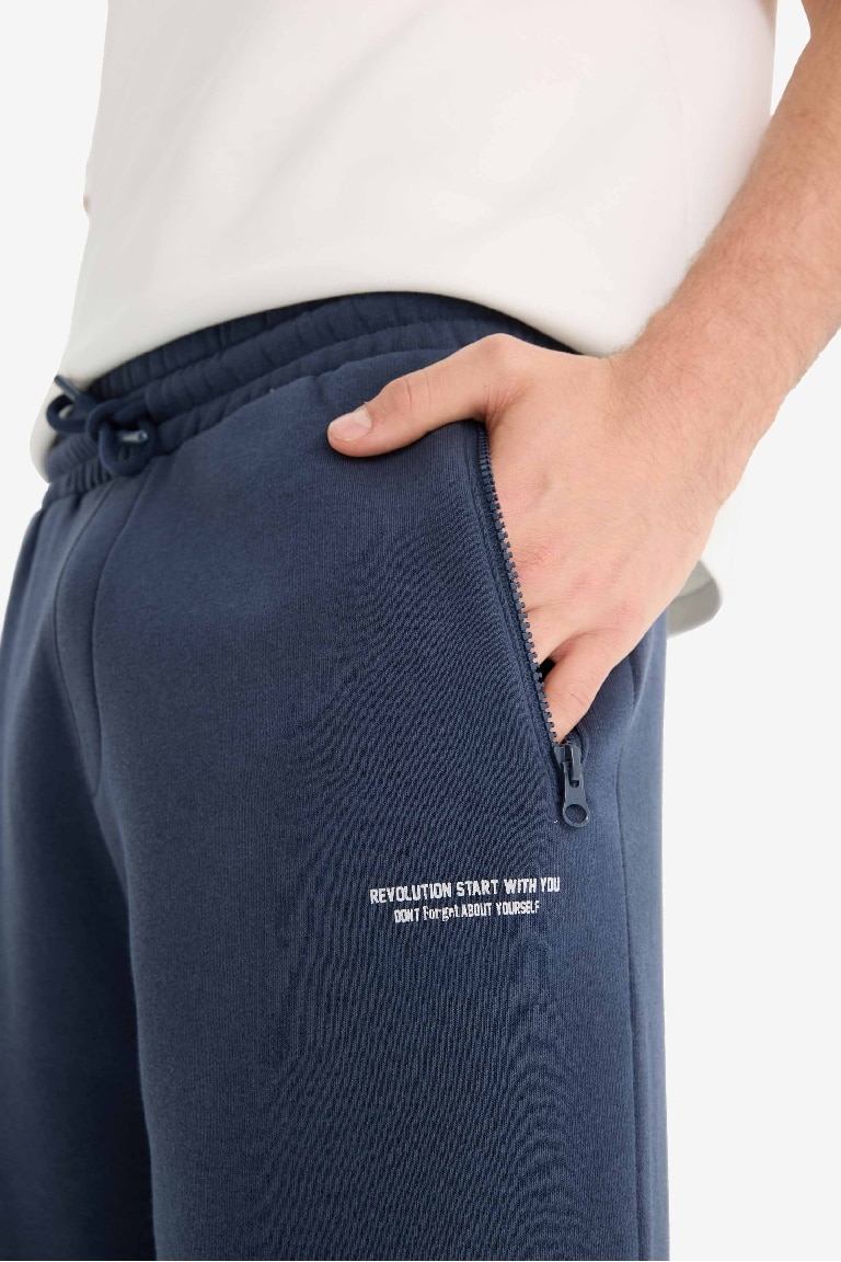 Regular Fit Beli Bağcıklı İçi Yumuşak Tüylü Paçası Lastikli Baskılı Fermuar Cepli Eşofman Altı