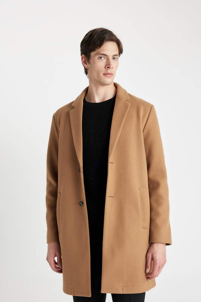 Manteau marron pour homme à coupe relax avec col de blazer à boutons et poches