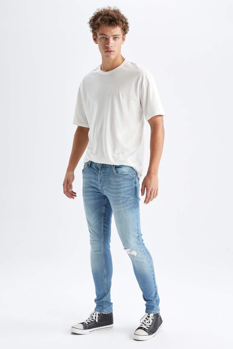 Skinny Comfort Fit Dar Rahat Kalıp Normal Bel Ekstra Dar Paça Yırtık Detaylı Jean Pantolon