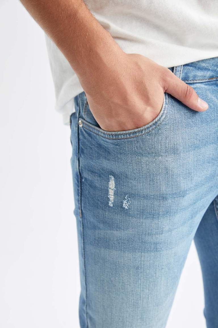 Skinny Comfort Fit Dar Rahat Kalıp Normal Bel Ekstra Dar Paça Yırtık Detaylı Jean Pantolon