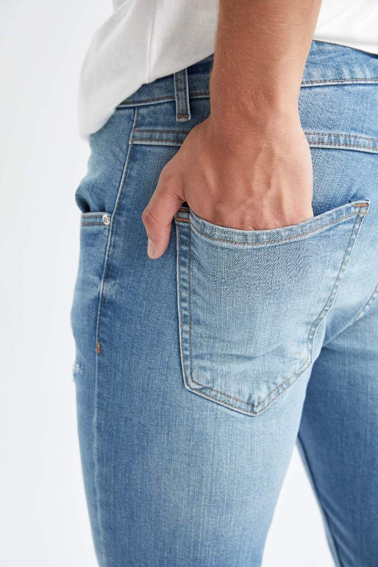 Skinny Comfort Fit Dar Rahat Kalıp Normal Bel Ekstra Dar Paça Yırtık Detaylı Jean Pantolon