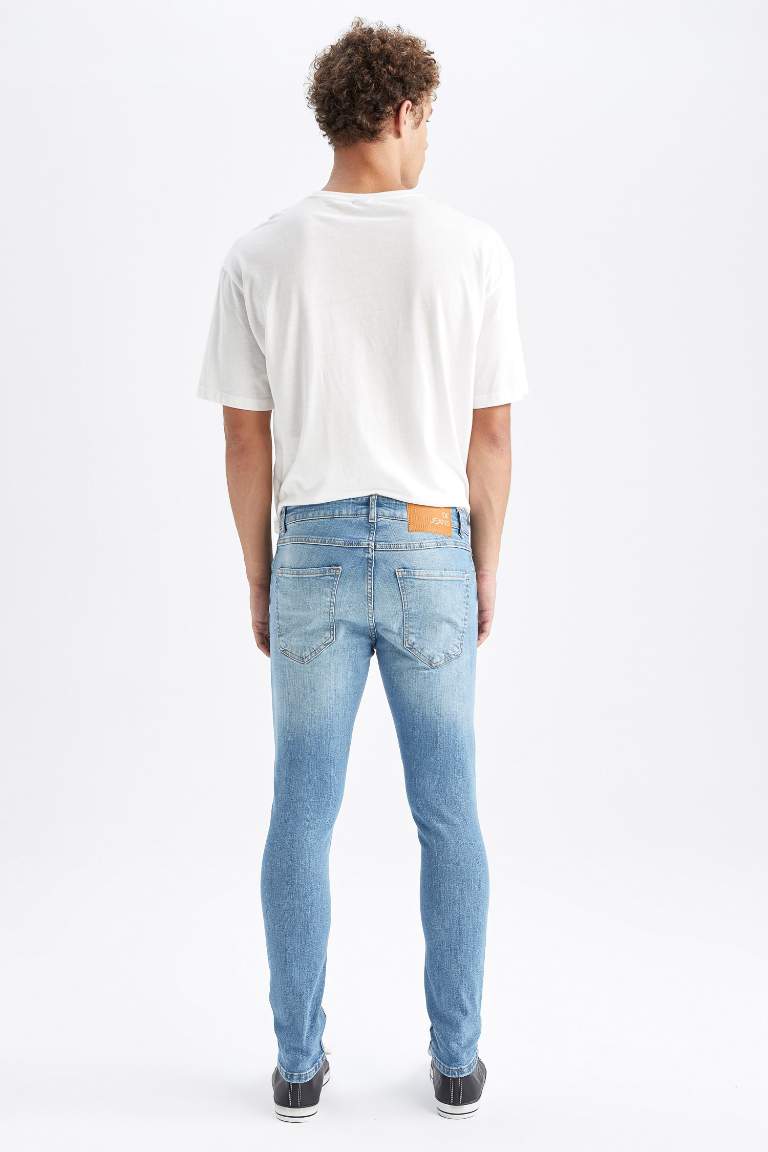 Skinny Comfort Fit Dar Rahat Kalıp Normal Bel Ekstra Dar Paça Yırtık Detaylı Jean Pantolon
