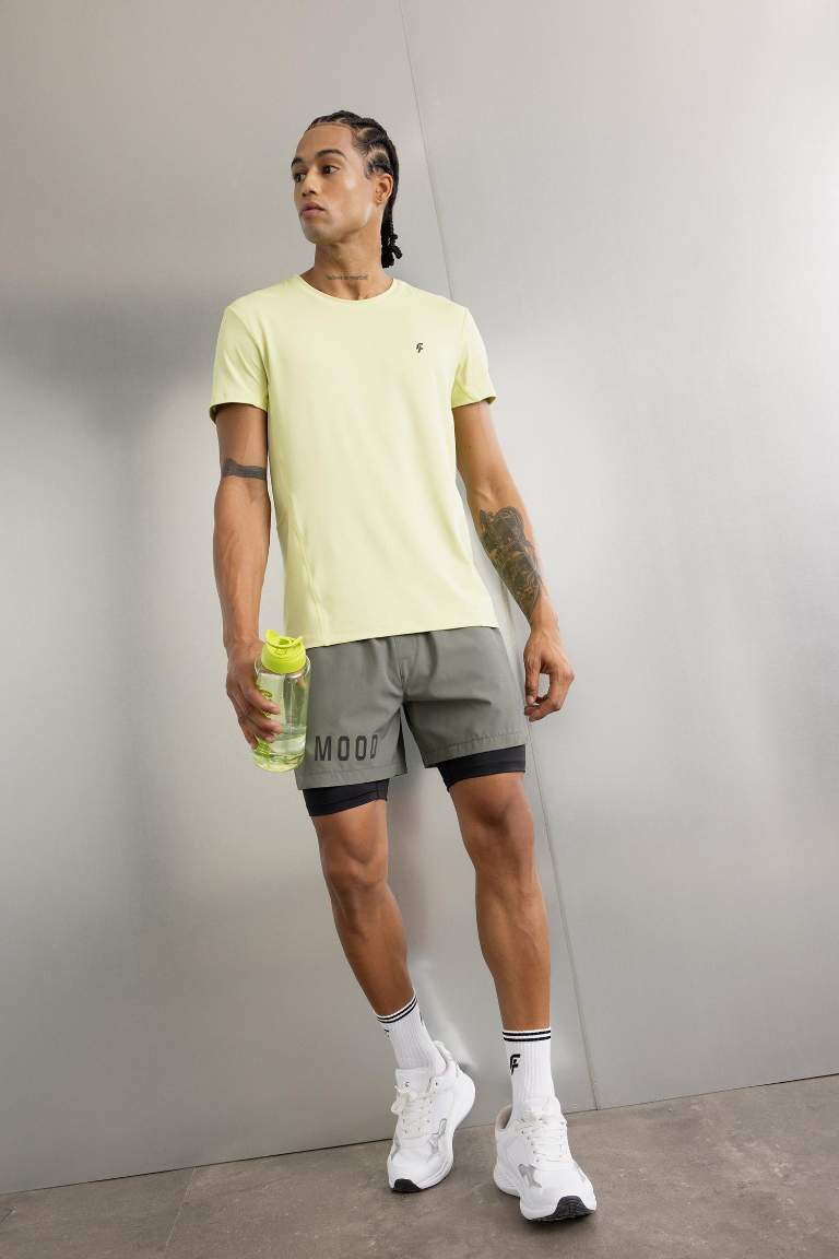 DeFactoFit Slim Fit Dar Kesim Fermuarlı Telefon Cepli Sporcu Taytlı Şort