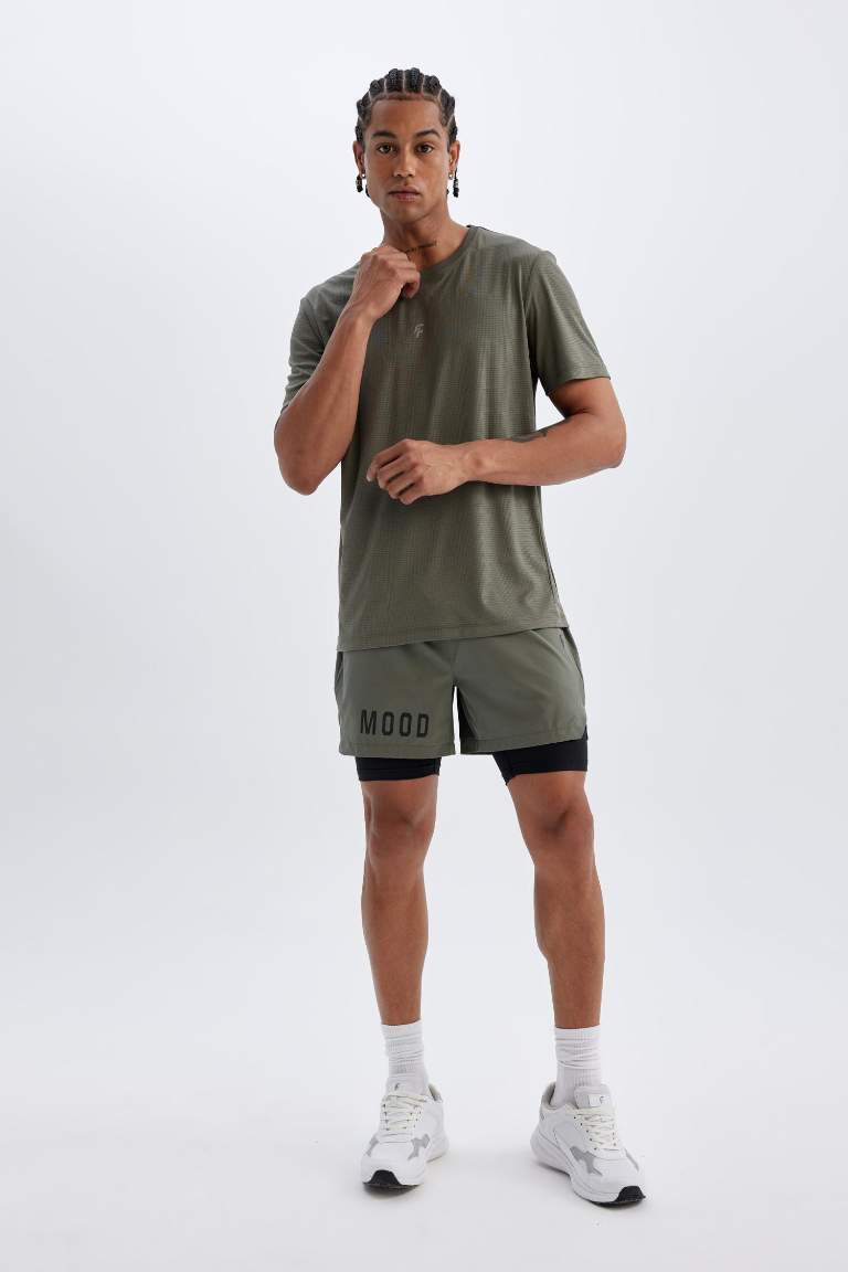 DeFactoFit Slim Fit Dar Kesim Fermuarlı Telefon Cepli Sporcu Taytlı Şort