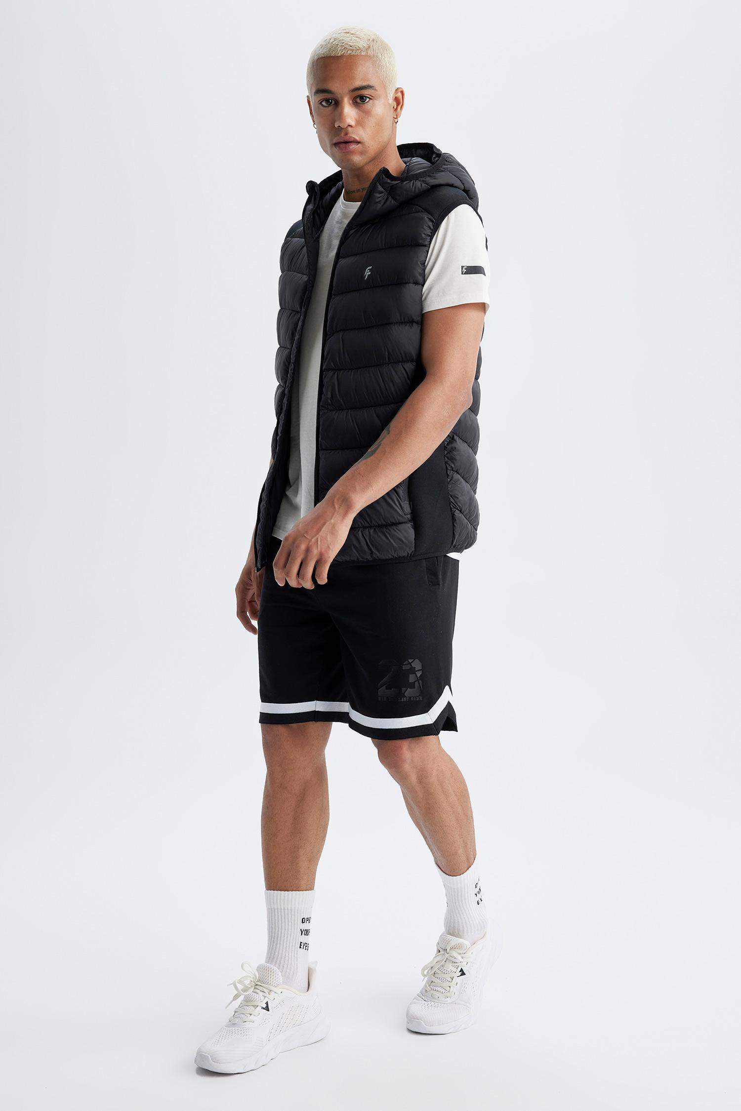 DeFactoFit Slim Fit Su İtici Kapüşonlu Yanları Squba Kumaş Şişme Yelek