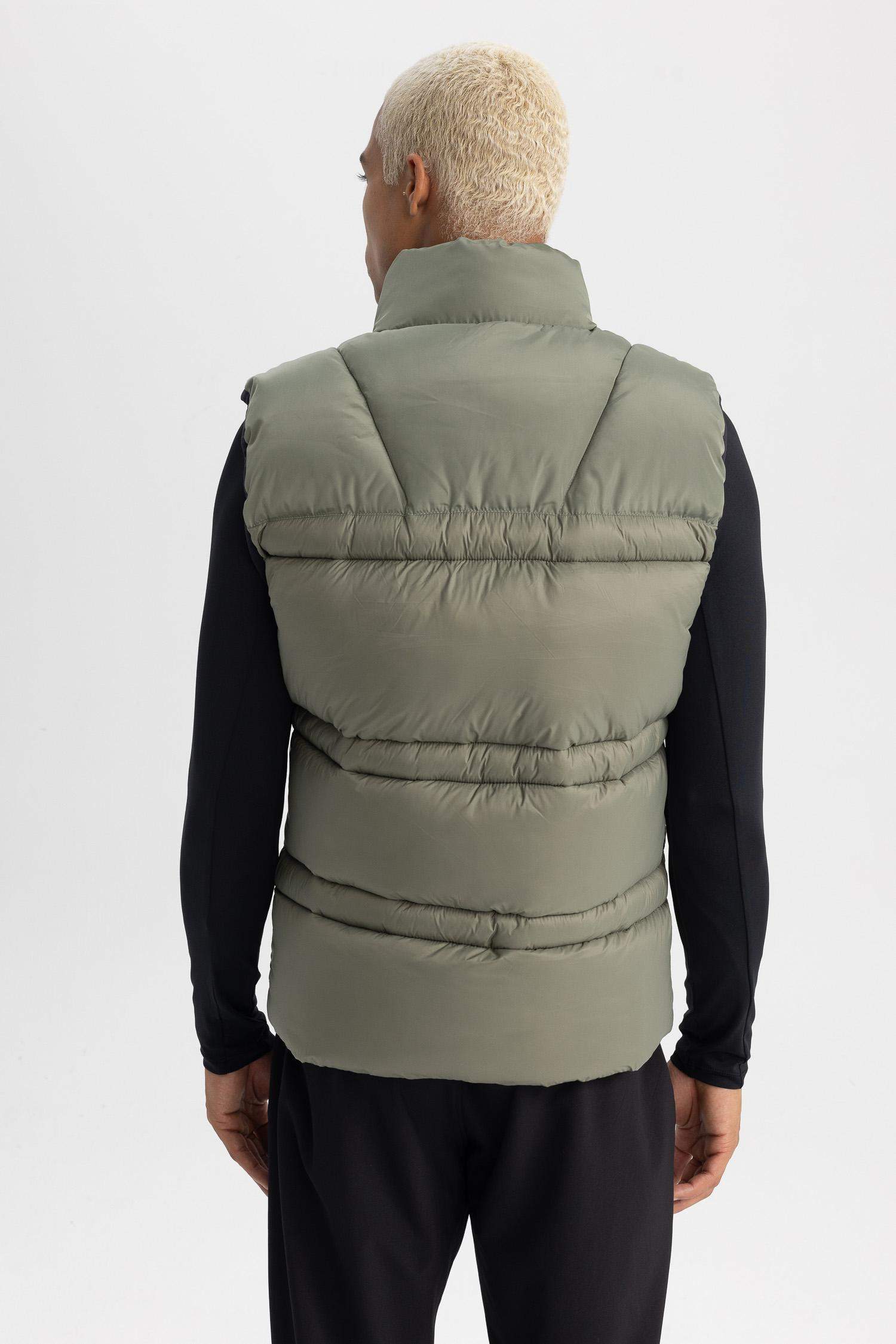 қалыпты пішім Жилет