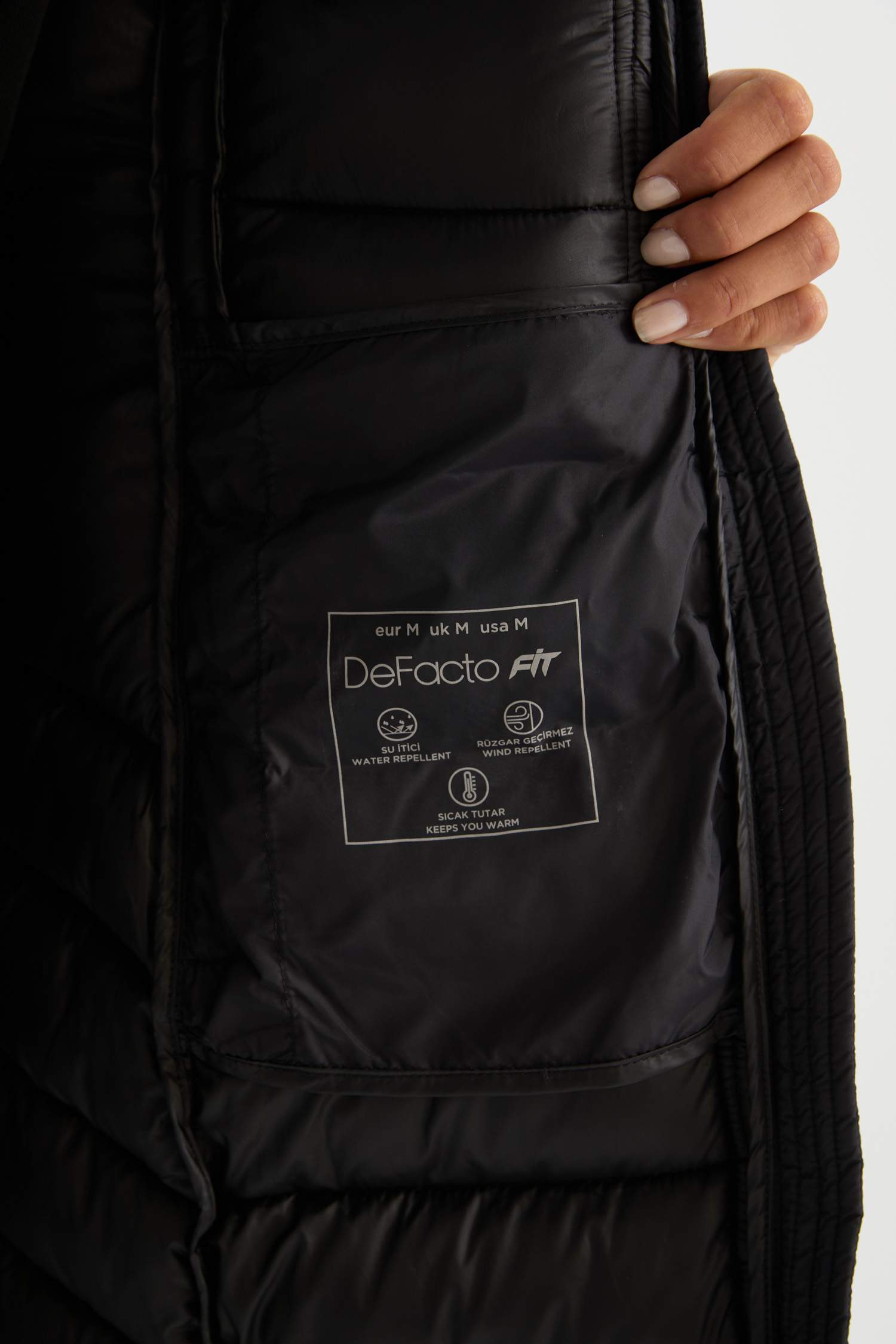 DeFactoFit Su İtici Slim Fit Dar Kesim Kapüşonlu Kapitoneli Fermuarlı Cepli Uzun Şişme Mont Parka