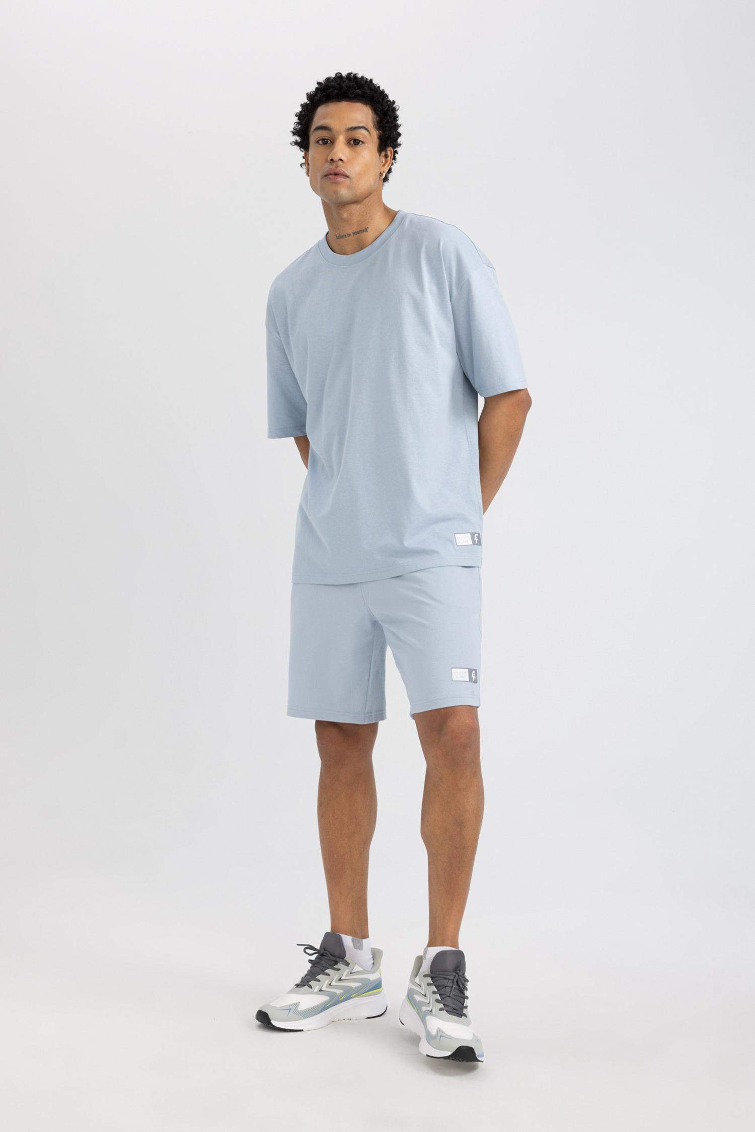 شورت قصير سليم فيت أزرق من DeFactoFit