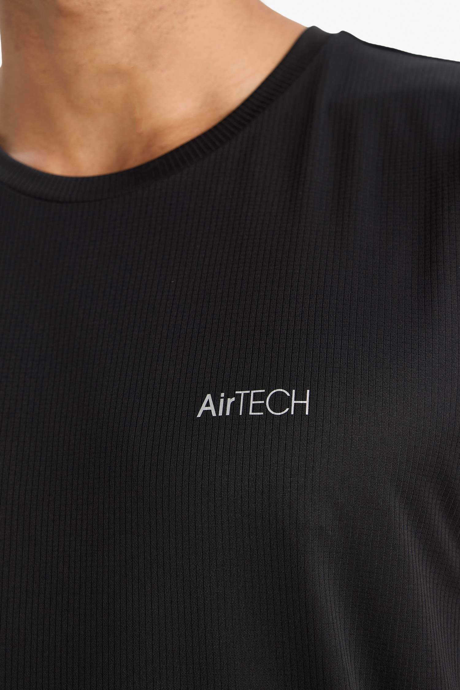 تانك توب رياضي قصة عادية سريع الجفاف من DeFactoFit