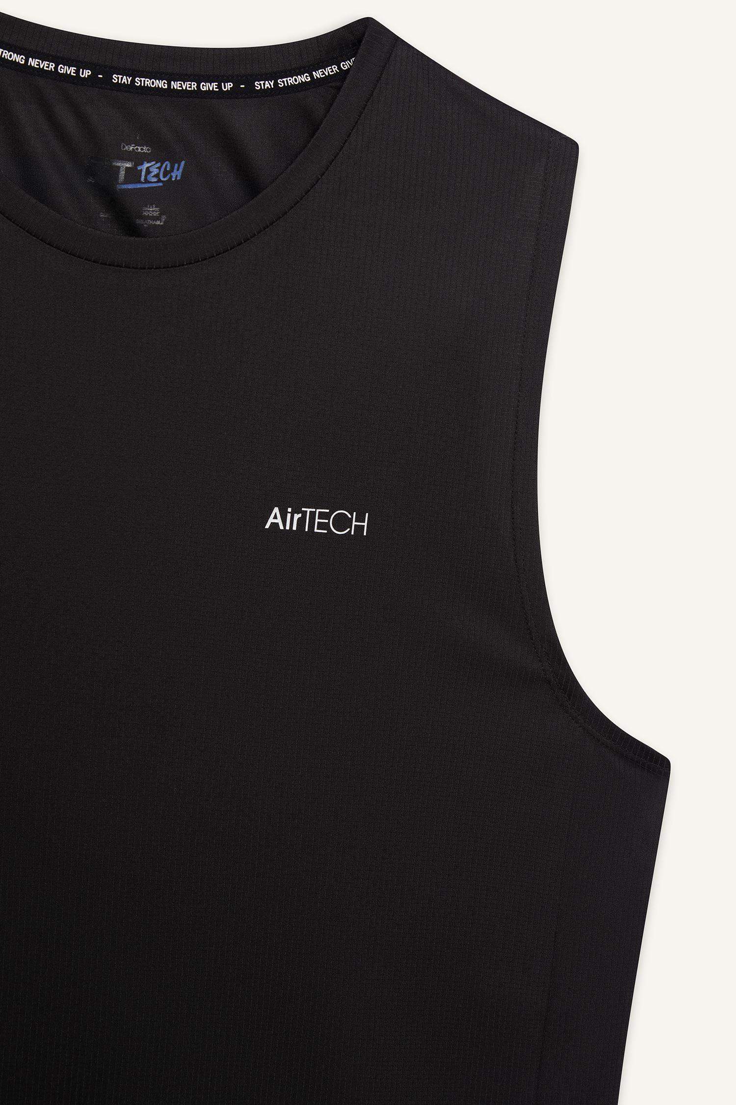 تانك توب رياضي قصة عادية سريع الجفاف من DeFactoFit