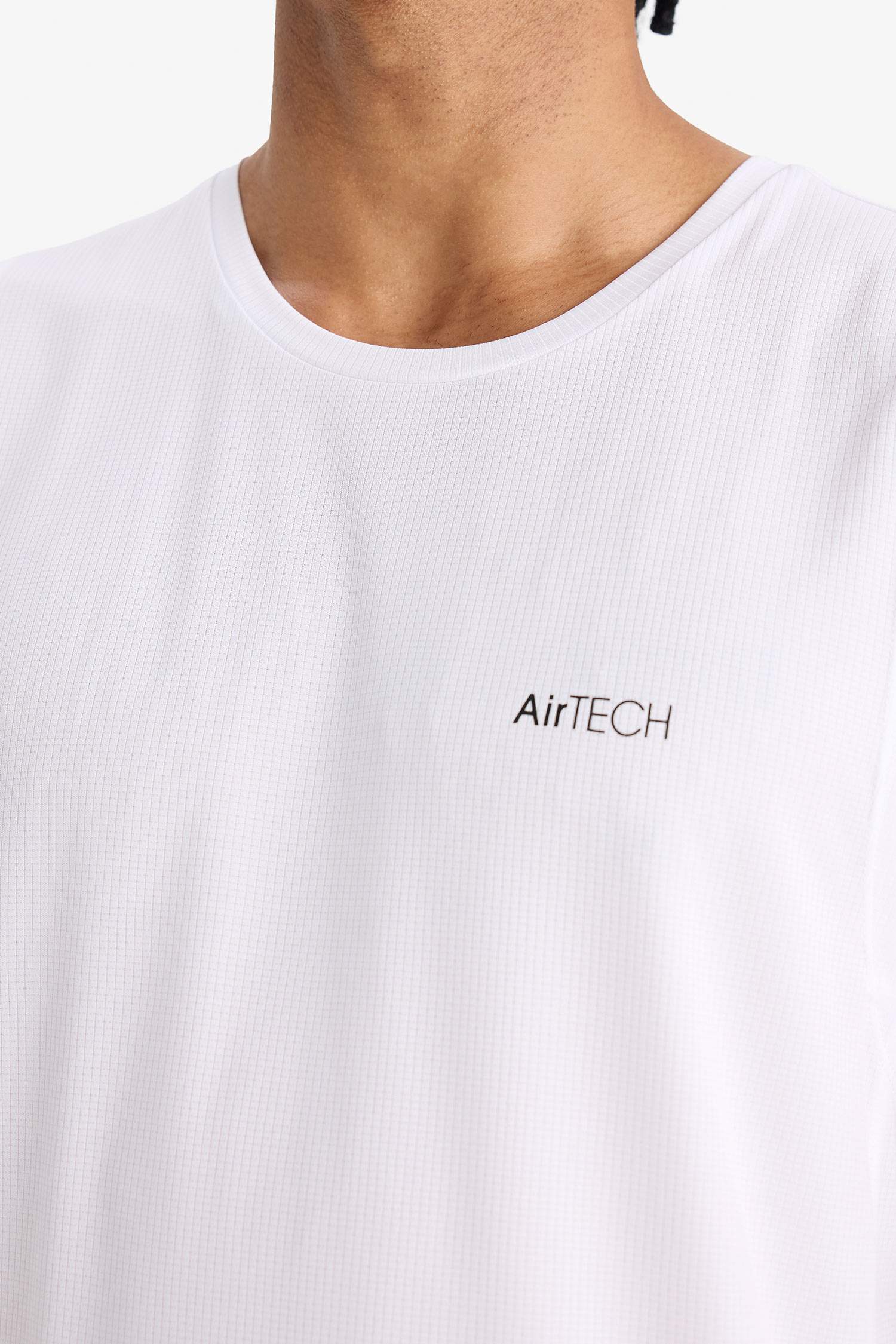 تانك توب رياضي قصة عادية سريع الجفاف من DeFactoFit