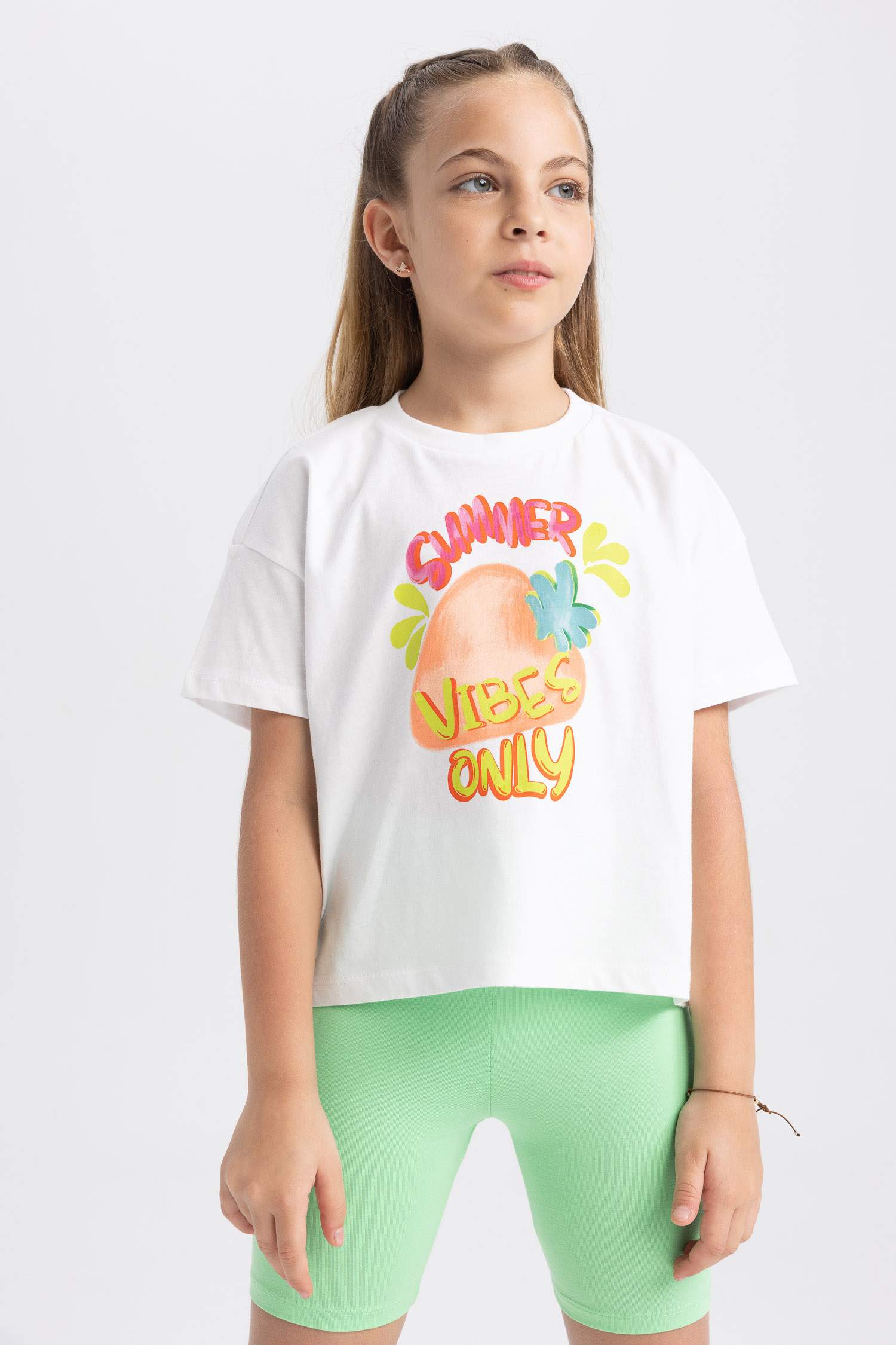 Қысқа жеңді басылған қыздарға арналған футболка